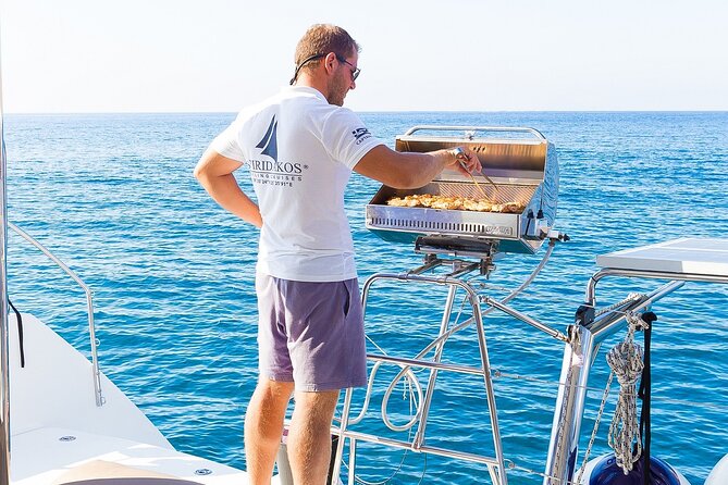 Premium Small-Group Catamaran Cruise with BBQ, Open Bar, Transfer - Comfort, gear, and swim readiness for Santorini’s stop-and-go schedule