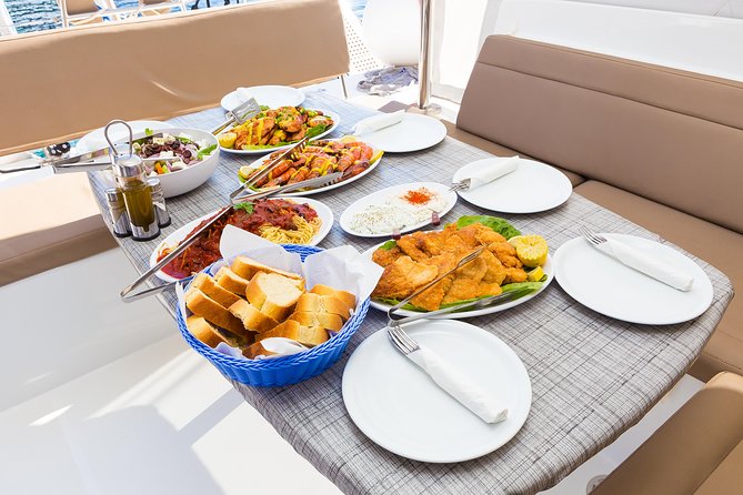 Premium Small-Group Catamaran Cruise with BBQ, Open Bar, Transfer - Day sail or sunset sail: which fits your priorities