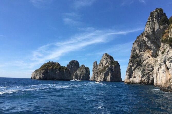 Private Capri Luxury Boat Experience: Cruise, Swim & Sunbathe - On Board: Towels, Drinks, Snacks, and the Pace You Control