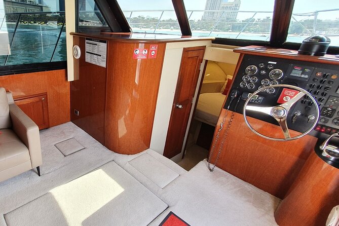 Private Dubai 2 Hours Luxury Yacht Charter with BBQ Option - Onboard setup: captain, two crew members, drinks, and the BBQ option
