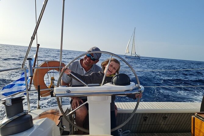 Private luxury Escape Sailing, Snorkel and Lunch Cruise - Sunset time: anchoring, fish-feeding moments, and dolphins (when the sea cooperates)