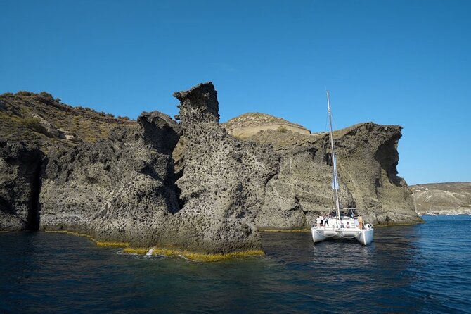 Private Luxury Santorini Catamaran Cruise with Port Pickup - Nea Kameni meal stop: Greek food with a caldera view