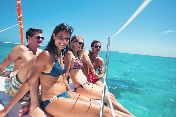 Private Luxury Santorini Catamaran Cruise with Port Pickup - The cruise between stops: White Beach and Indian Rock from the water