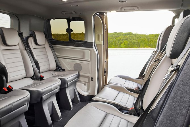 Private Transfer from Munich Airport to Munich City by Luxury Van - Finding your chauffeur at MUC: sign, arrivals hall, and delays