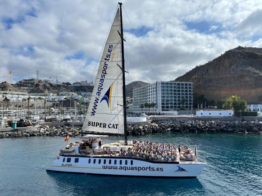 Puerto Rico de Gran Canaria: Premium Dolphin Catamaran Tour - Banana boat and discounted water sports: built for action, priced to add it