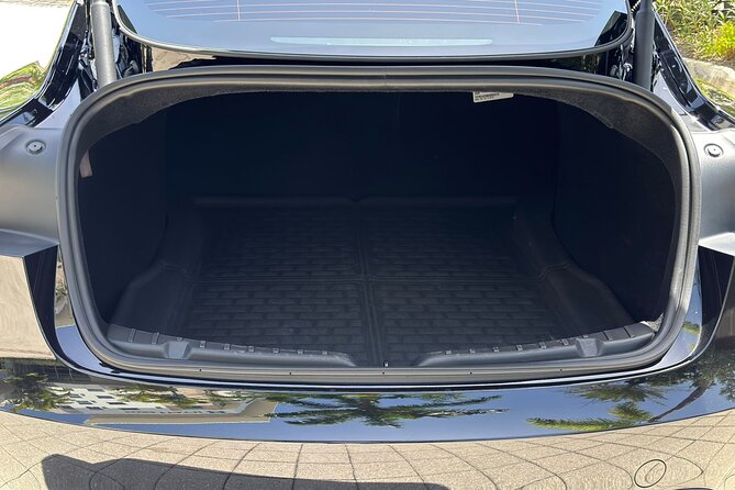 Puerto Rico Island Wide Private Transfers, Tesla 3 Luxury Sedan. - Luggage Space and Easy Handling for Real Departures