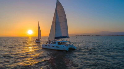 Puerto Vallarta: Bay of Banderas Luxury Sunset Sailing Tour - Luxury comfort on monohull or catamaran: cushions, breeze, and seating reality