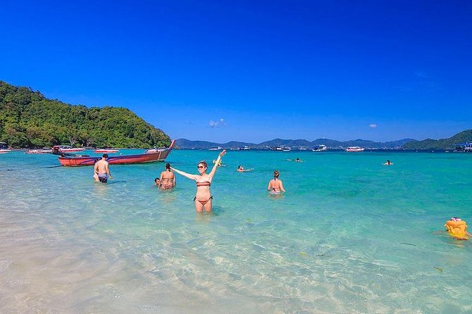 Racha and Coral Island One Day Trip + Sunset by Luxury Catamaran From Phuket - Stop 2: Koh Racha Yai (Racha Island) snorkeling with catamaran-to-longtail transfers