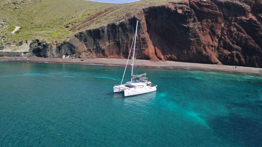 Santorini: Caldera Luxury Catamaran Cruise w/ Meal & Drinks - White Beach Photo Stop: Beautiful, Quick, and Made for Pictures