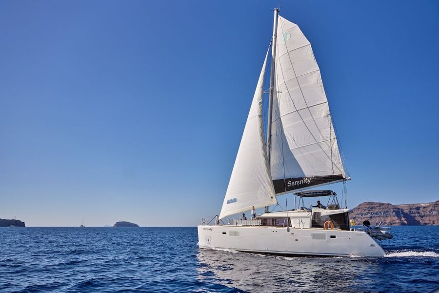 Santorini: Day Luxury Catamaran Cruise with Meal & Drinks - A morning catamaran cruise makes Santorini feel less crowded