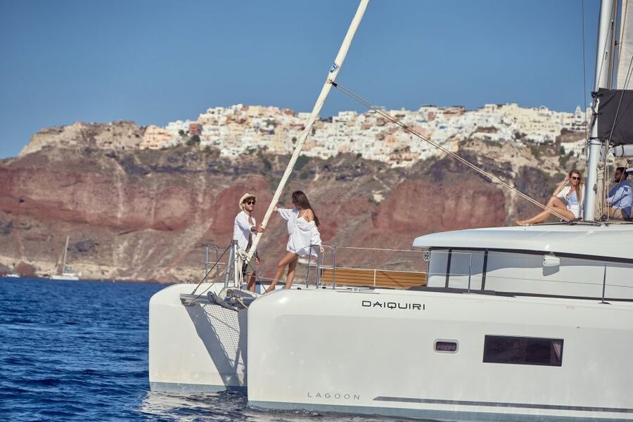 Santorini: Day Luxury Catamaran Cruise with Meal & Drinks - Thirassia Island snorkeling: cool water and a different view of the caldera
