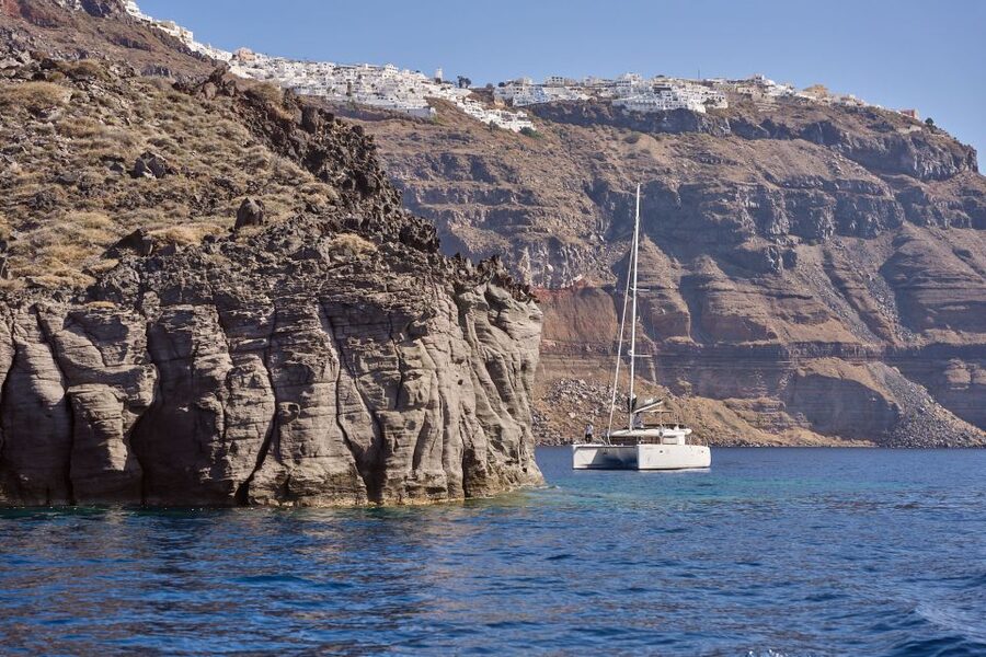 Santorini: Day Luxury Catamaran Cruise with Meal & Drinks - What the cruise feels like: 4 hours of comfort, music, and calm