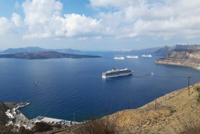 Santorini Full Day Trip by Santo Luxury Escape - Oia first: blue-domed views and cave-house history in about an hour