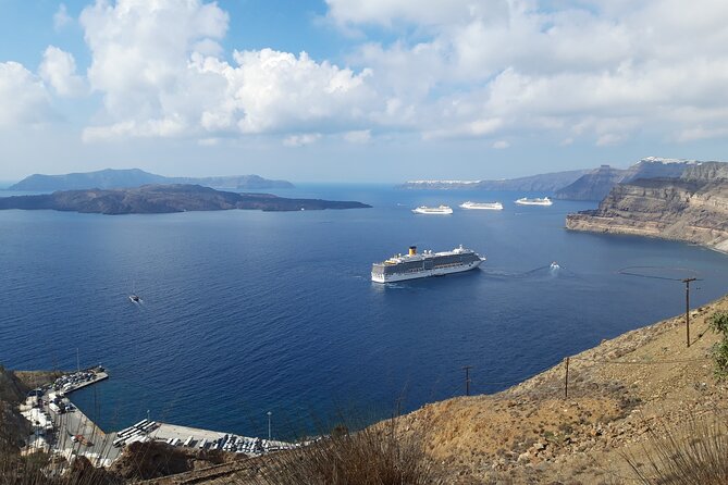 Santorini Full Day Trip by Santo Luxury Escape - Oia first: blue-domed views and cave-house history in about an hour