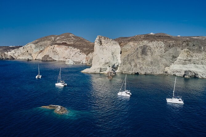 Santorini: Luxury Catamaran Cruise with Fresh Fish BBQ & Drinks - Why this catamaran route feels different on Santorini