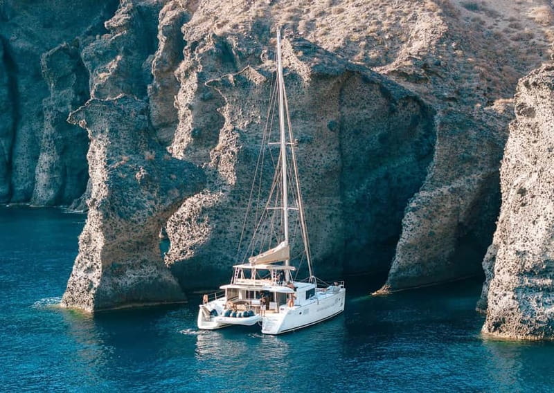 Santorini: Luxury Catamaran Cruise with Lunch, BBQ & Drinks - A 5-hour catamaran day that starts in Vlychada