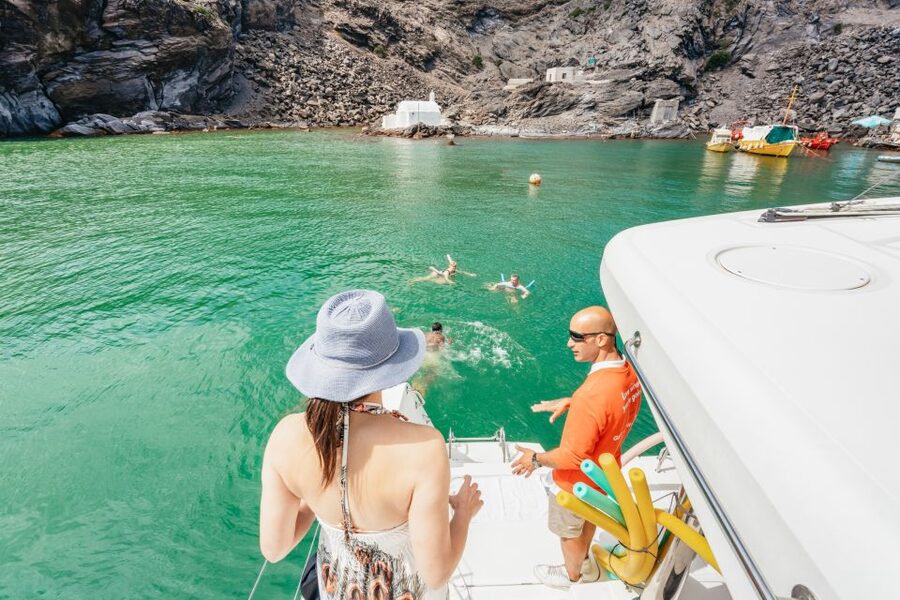 Santorini: Luxury Catamaran Day Trip with Meal and Open Bar - What to pack for this specific day on the water
