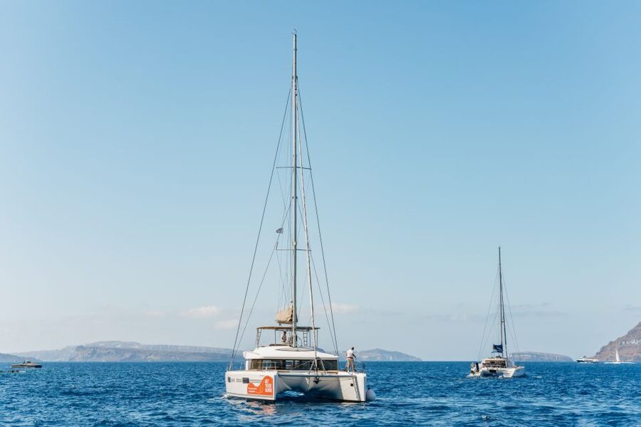 Santorini: Luxury Catamaran Day Trip with Meal and Open Bar - Why this luxury catamaran feels different in Santorini