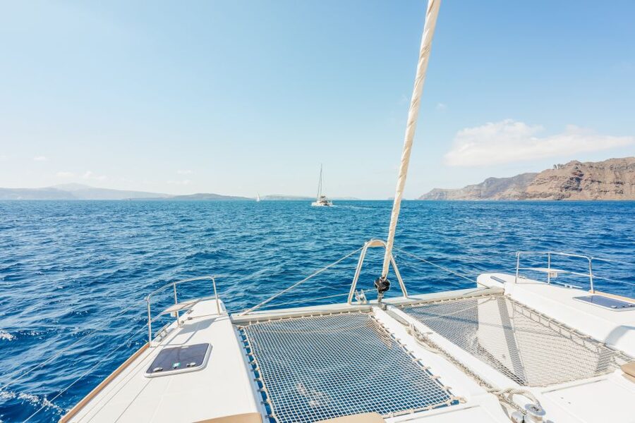 Santorini: Luxury Catamaran Day Trip with Meal and Open Bar - Red Beach to White Beach sea caves: the swim-and-snorkel loop