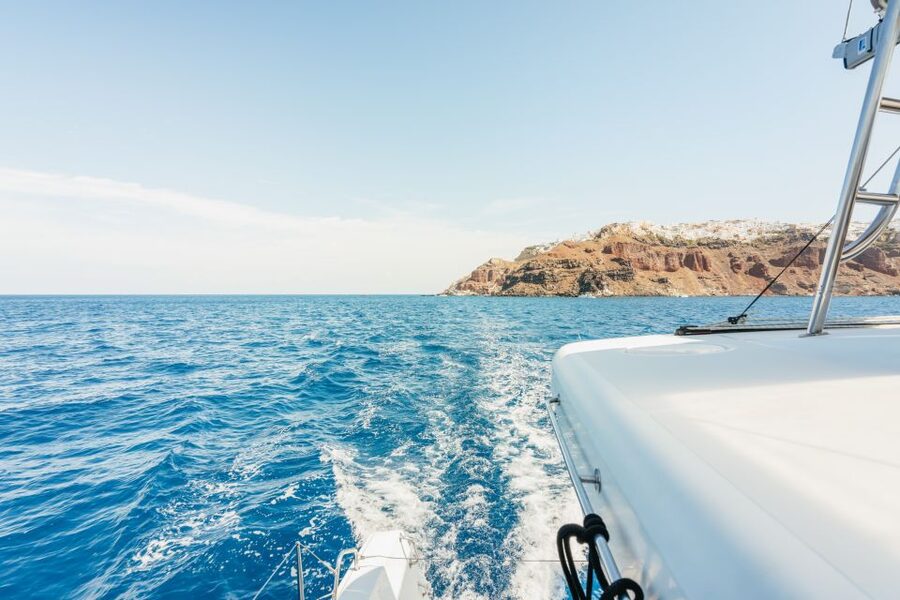 Santorini: Luxury Catamaran Day Trip with Meal and Open Bar - Oia at sunset: the photo spot without the full-on crush
