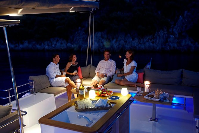Santorini Luxury Catamaran Sunset Cruise with BBQ, Drink and Transfer - Hot springs stop: warm water with the volcano close by