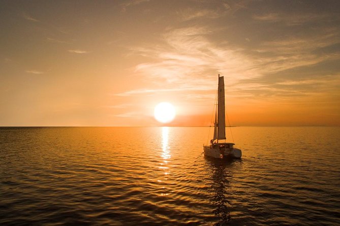 Santorini Luxury Catamaran Sunset Cruise with BBQ, Drink and Transfer - Transfers, boarding rules, and what to bring