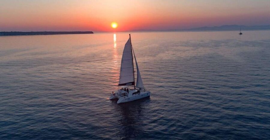 Santorini: Luxury Sunset Cruise with Dinner & Open Bar - The volcanic islands and hot springs: where the water steals the show