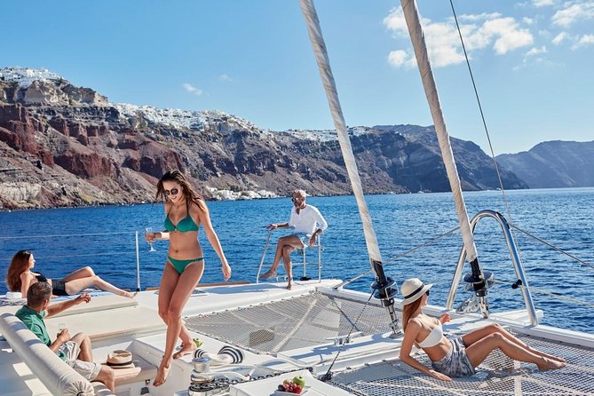 Santorini Sunset Luxury Sailing Catamaran Cruise with BBQ, drinks, transfer - Red Beach and White Beach: the swim stops that make the cruise worth it