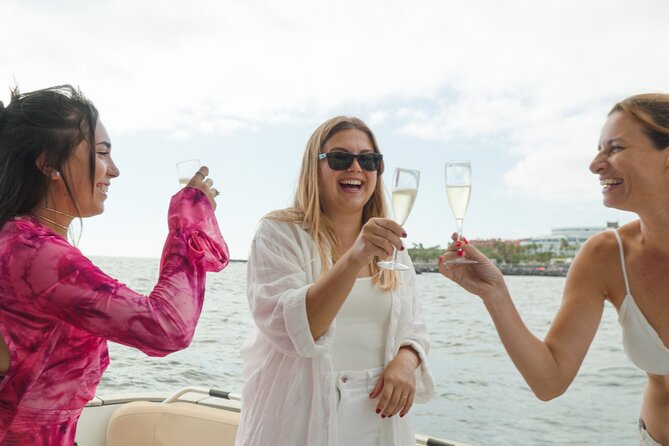 Shared Luxury Yacht Cruise with Champagne and Tapas - Playa del Duque: Water Toys, Snorkel Gear, and Tapas on Deck
