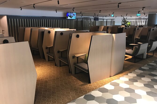 Singapore Changi Airport BLOSSOM - SATS & Plaza Premium Lounge at Terminal 4 - Entertainment and downtime: papers, TV, and a slower pace