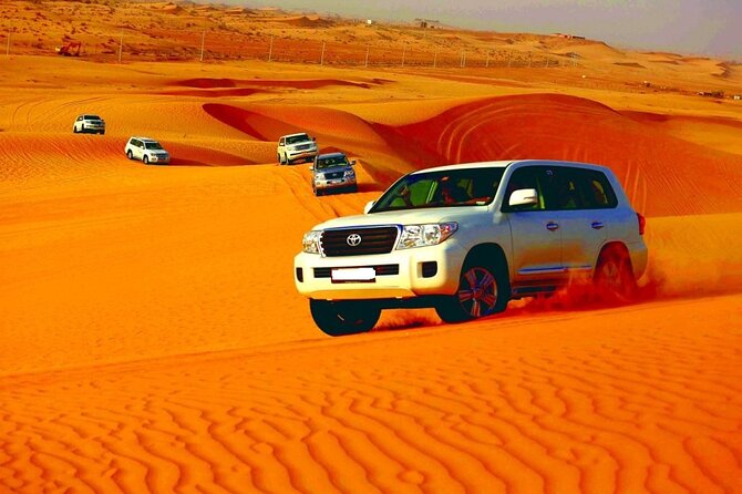 Sunset Desert Safari | Premium BBQ Dinner | Red Sand Dune - Henna, camel ride, shisha, and traditional dress for photos