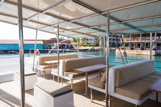 Sunset Sailing Cruise with premium drinks and bites - Catamaran Comfort: Nets, Open Water, and Where the View Happens