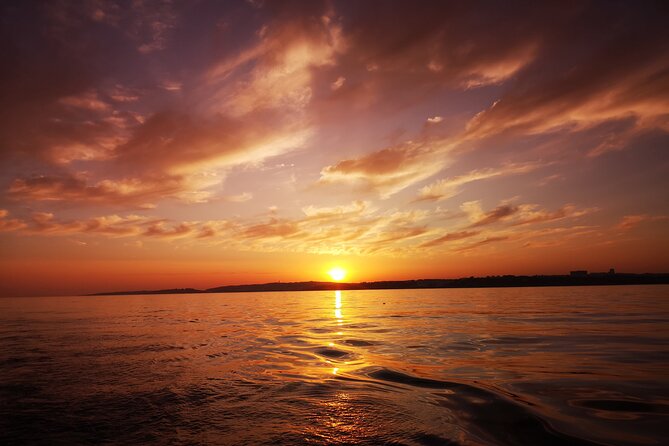 Sunset Tour on a Luxury Sailing Yacht from Vilamoura - Stop 3: The fishing village where sandy meets rocky