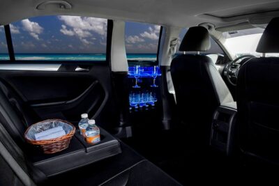 Transfers in Luxury Sedan from Cancun Airport - Finding Your Driver in Cancun: Tablet, Green Shirt, and WhatsApp