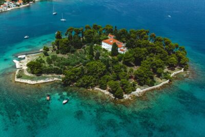 Zadar: 3 Islands Luxury Boat Tour with Aperol Spritz & Snorkeling - Stop 1: Ošljak Swim and Snorkel in Clear Adriatic Water