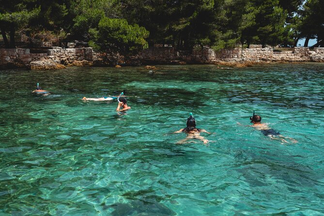 Zadar: 3 Islands Luxury Boat Tour with Aperol Spritz & Snorkeling - Stop 3: Skoljic Near Ugljan for Church Views and a Village Stroll